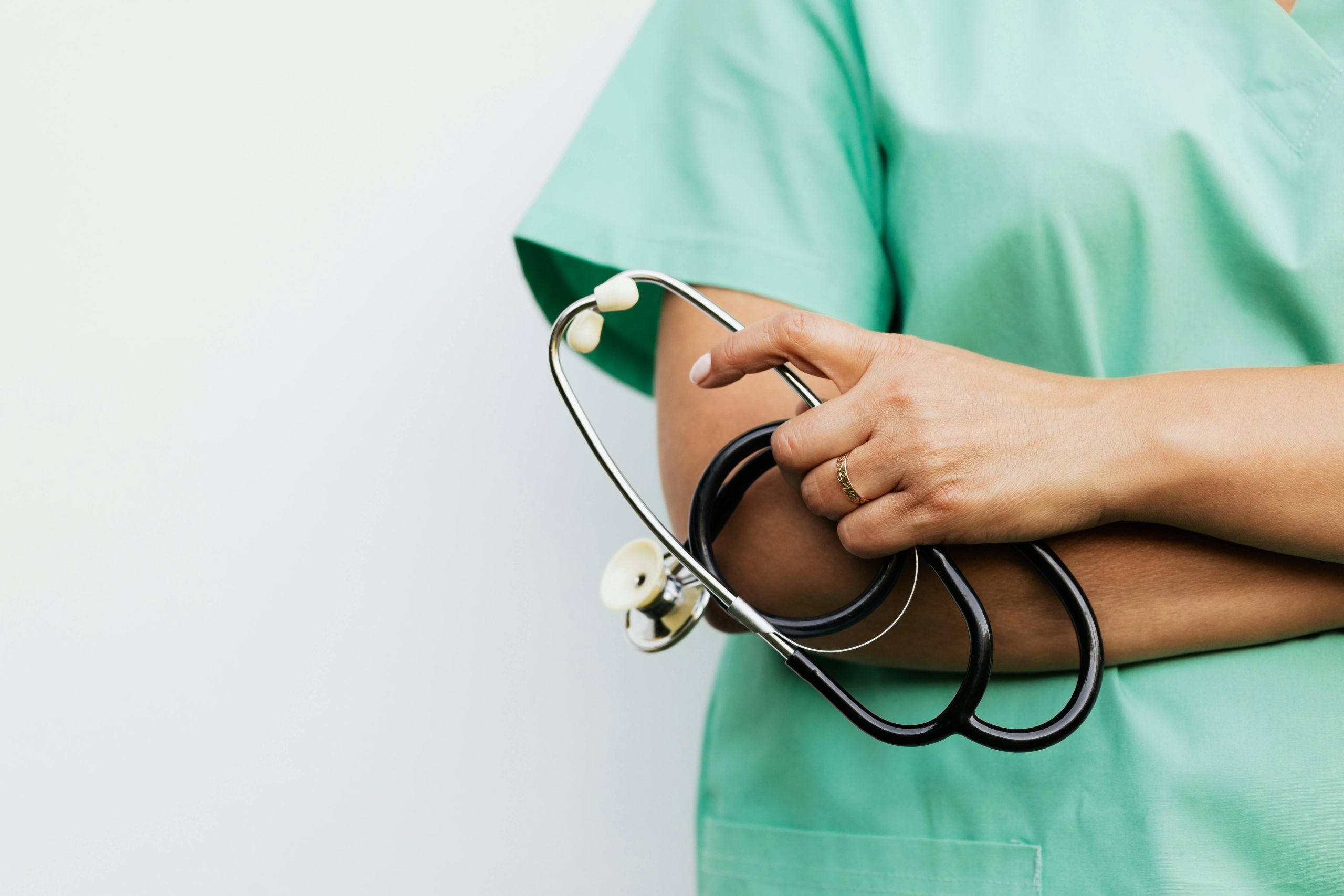 medical doctor with a stethoscope showcasing just one of O-Fams medical supplies and equipment's